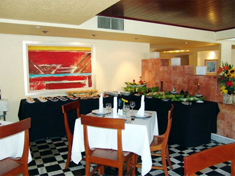Exe Suites San Marino México DF Restaurante foto